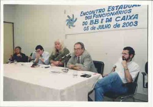 Encontro estadual do BB e da caixa –  centro: Miguel Anacleto, BB e sind. Esq: Luís Otávio, ger. Nac. RH Cx; Marlos Guedes, BB e sind.. Dir: Paulo DHAL, unid. Rel c/ funcional. BB e Miguel Correia, Cx/pres. do sindicato - Recife/PE 05/07/03 Alexandre Albuquerque